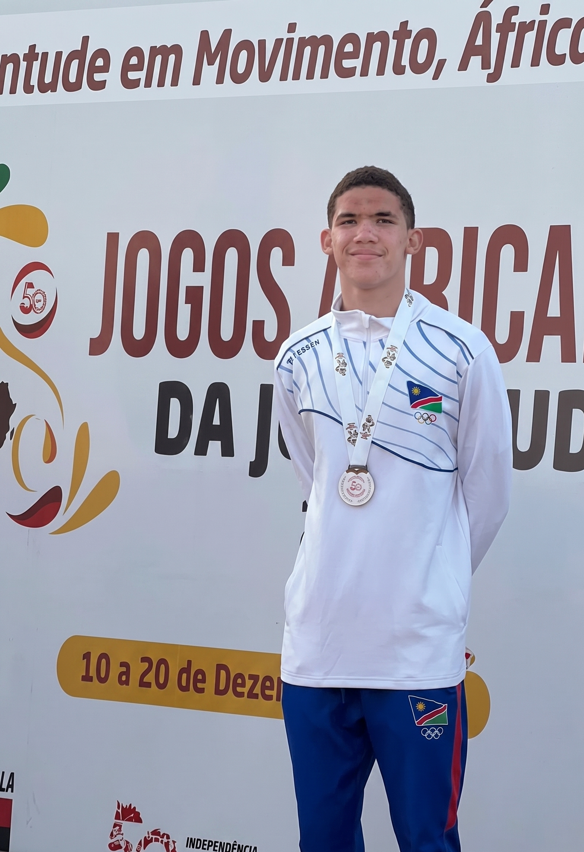 Lorenzo Esterhuizen on the podium at the African Youth Games in Angola