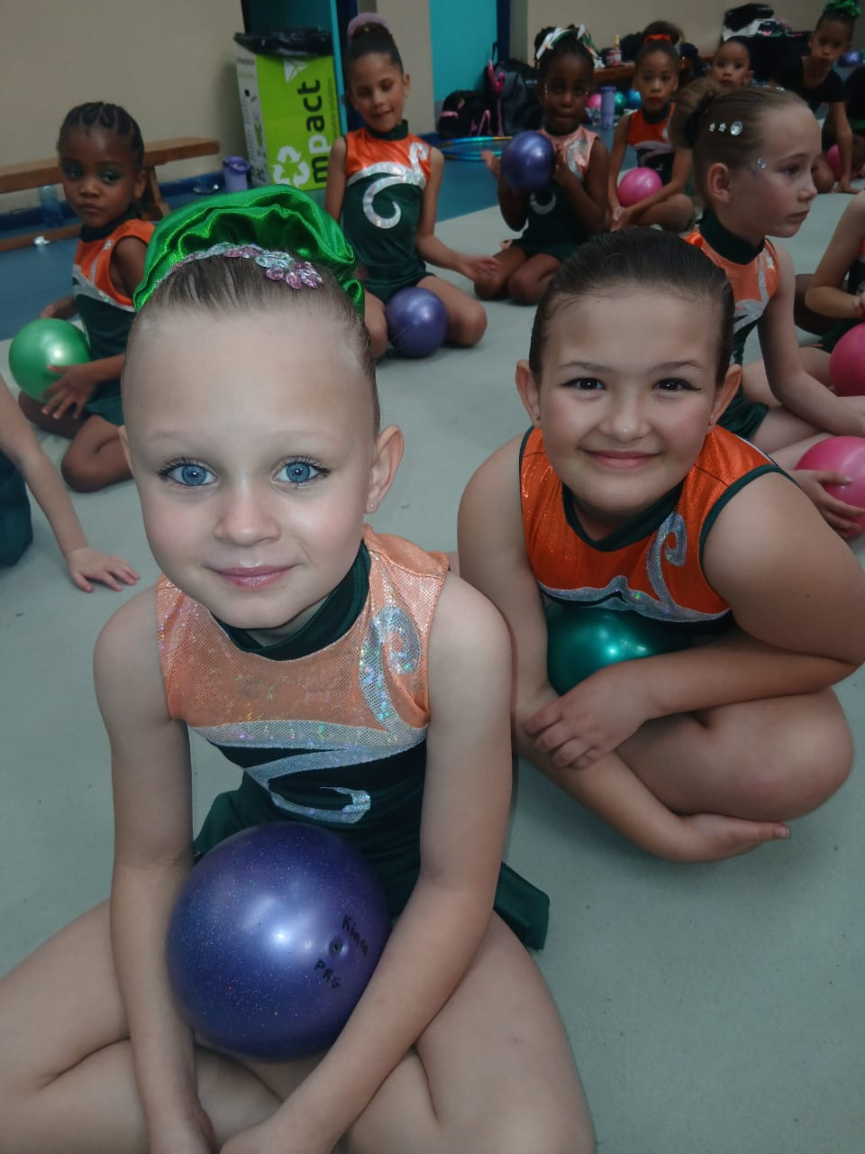 Zoé Lumé de Scande and teammate with gymnastics balls, Walvis Bay 2026