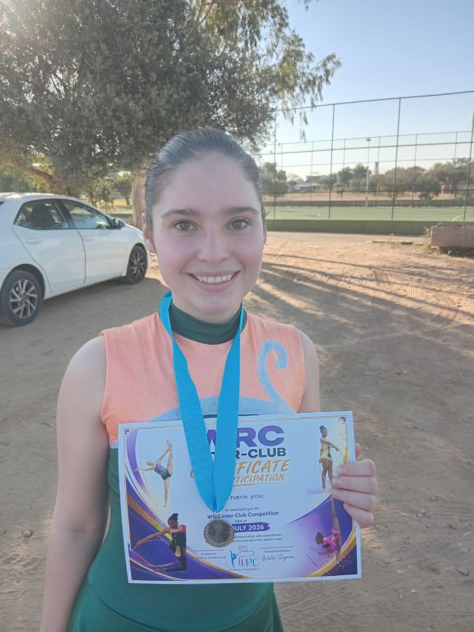 Hayley du Toit with her WRC Inter-Club Competition certificate and medal, July 2026